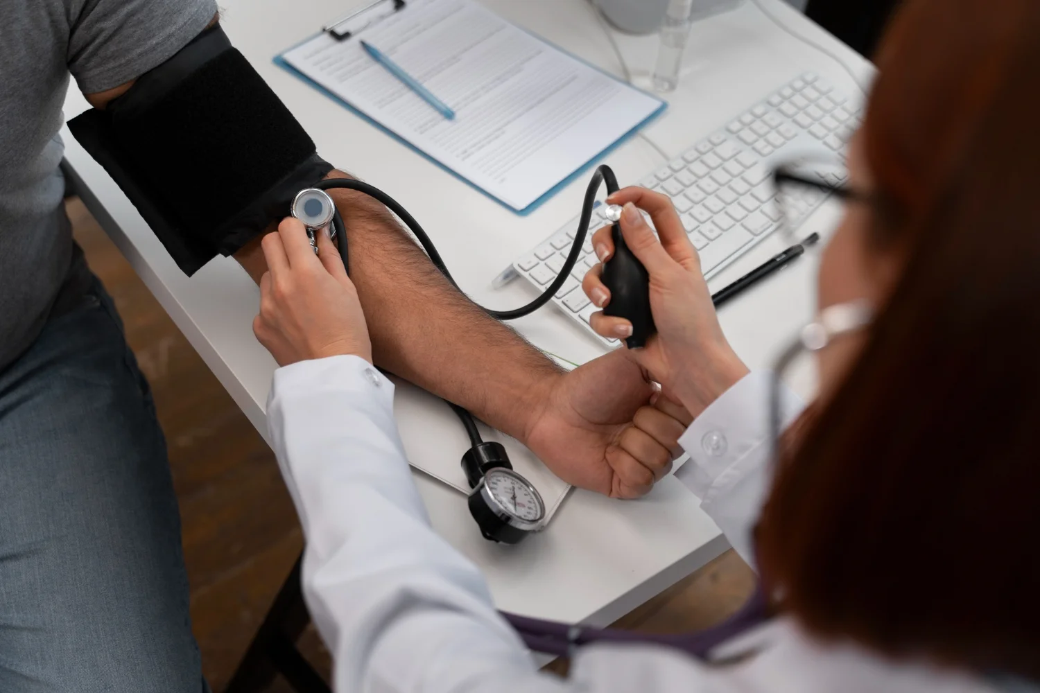 A doctor talking warmly with a patient